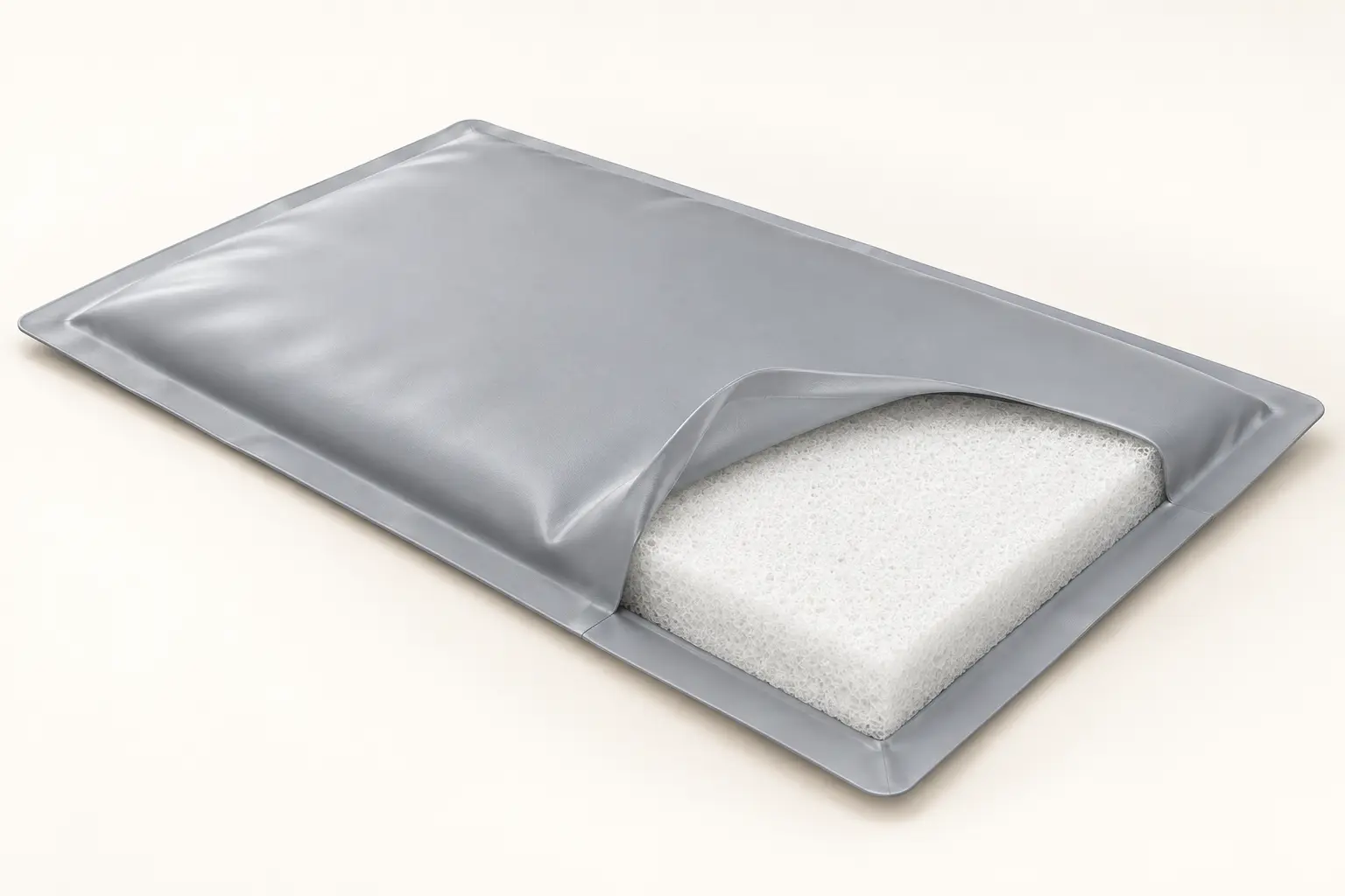 Cutaway showing the single-piece interior and sealed exterior of a Tuffr Vet Pad